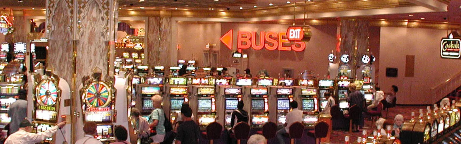 A row of slot machines on a casino gaming floor