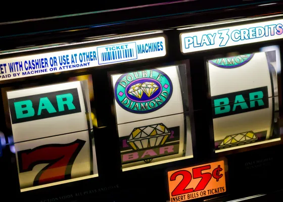 Slot reels stopped on a bar symbol.
